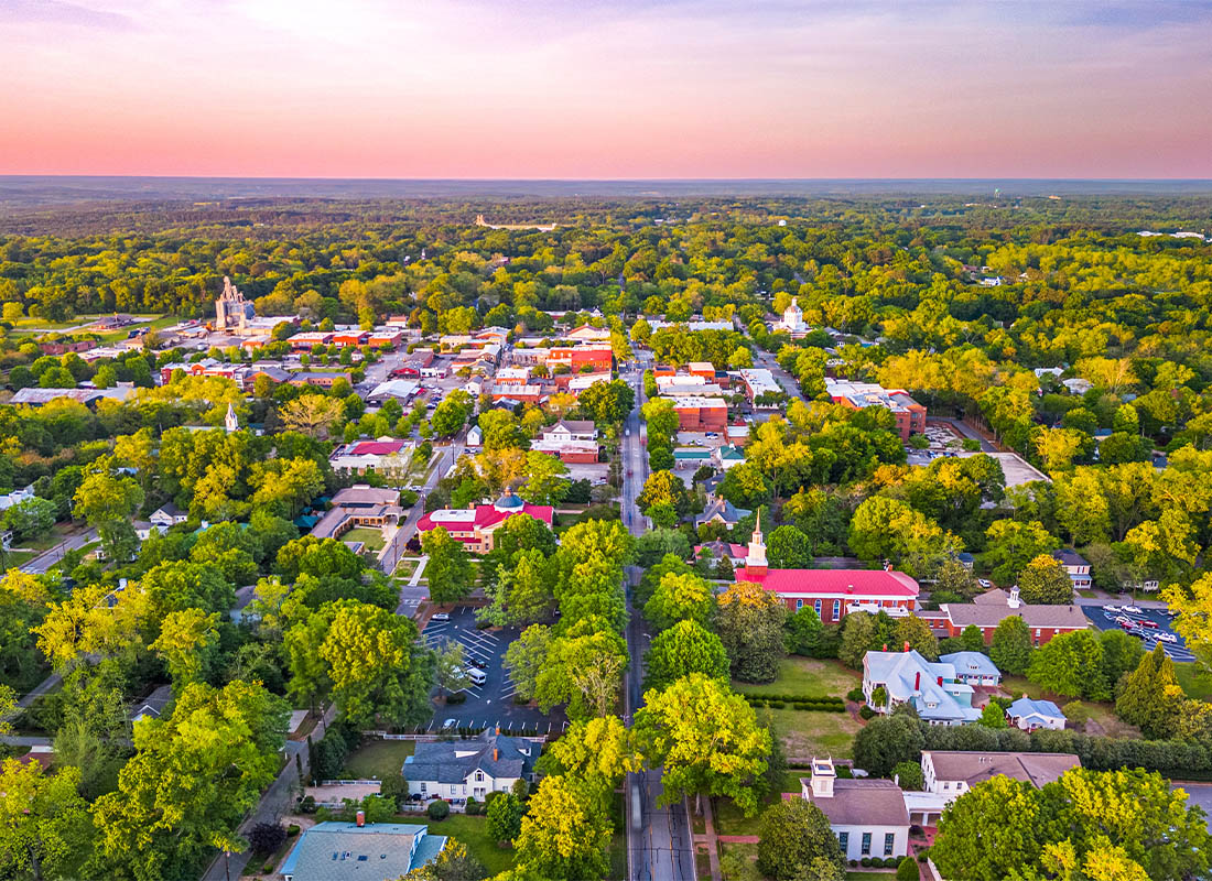 Loganville, GA - Madison, Georgia, USA Overlooking the Downtown Historic District at Dusk as the Sky Lights Up With Color